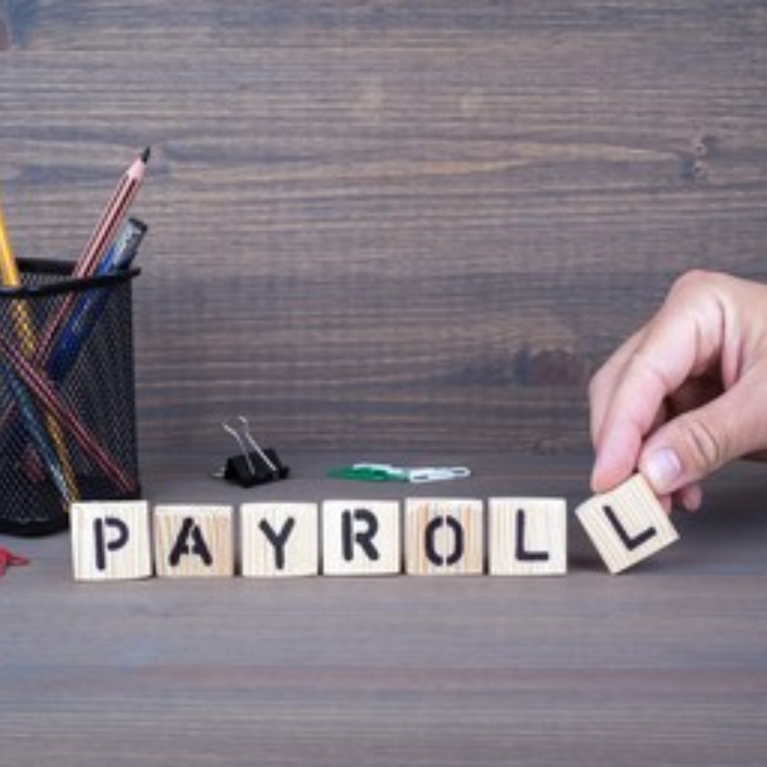 Scrabble tiles to spell payroll